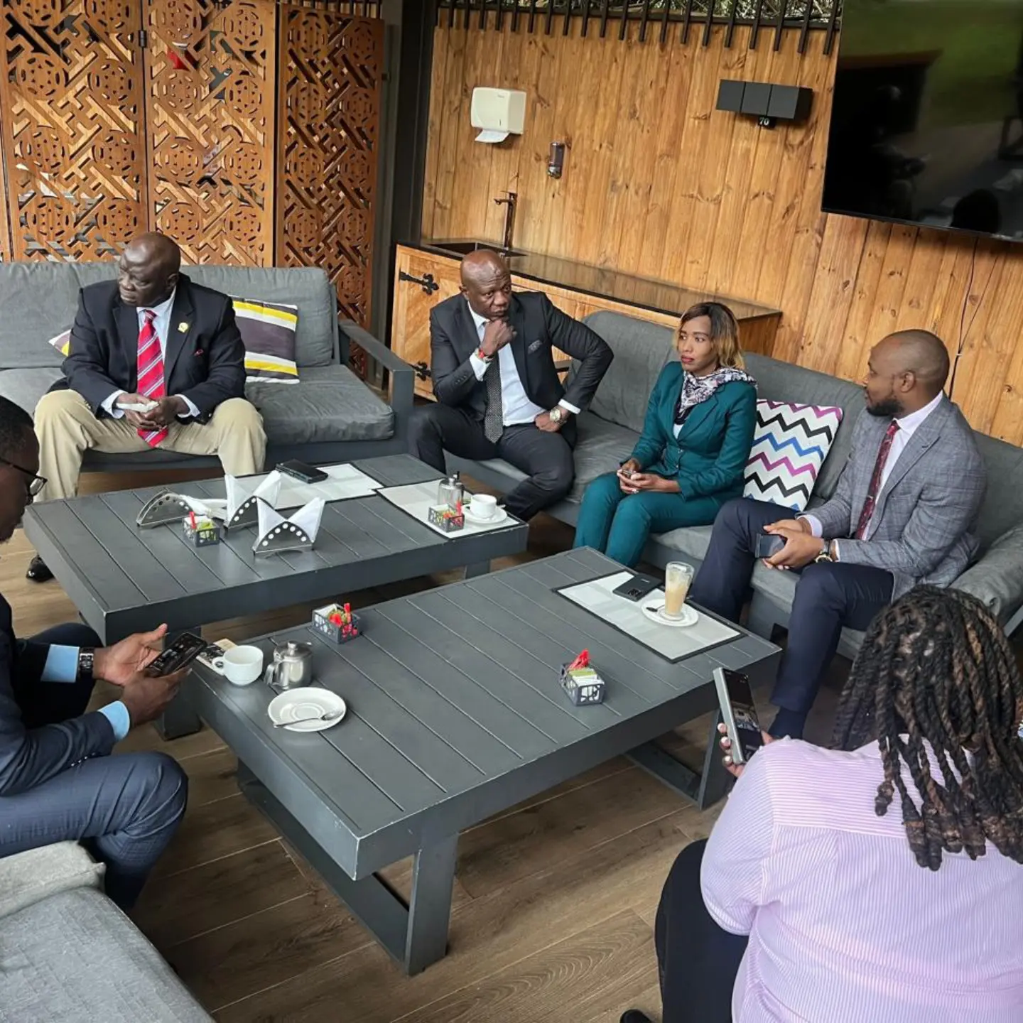 Joan Kanini in conversation with community representatives